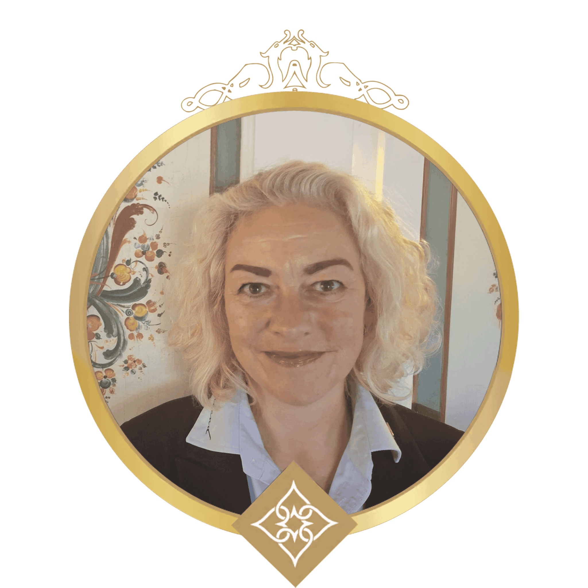 Circular portrait badge: smiling woman with short blonde hair, wearing a light blue collared shirt and dark blazer, framed by a gold ornate circular frame with a decorative crest at the bottom.